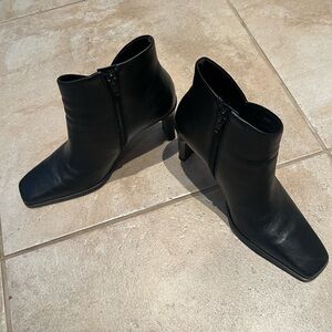 Chic Black Leather Heeled Boots